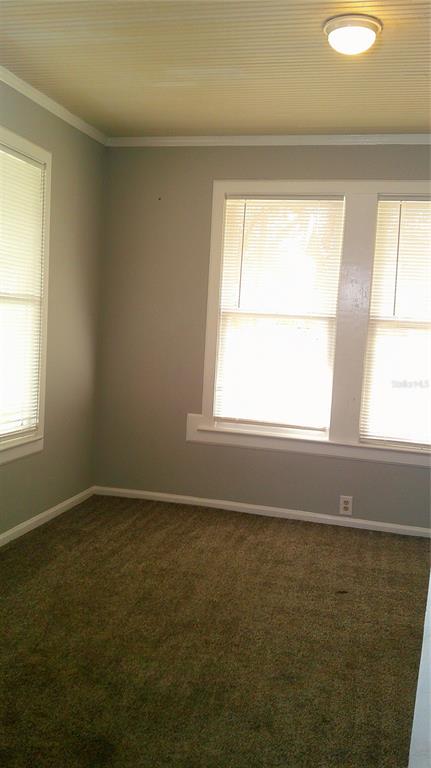 4609 Gallagher Road Plant City, FL 33565 - Photo 7 of 23 a view of an empty room with a window