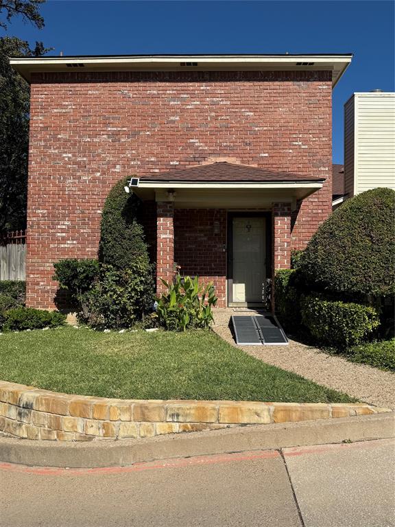 3133 Sappington Place, Unit D Fort Worth, TX 76116 - Photo 28 of 28 a front view of a house with a garden and garage
