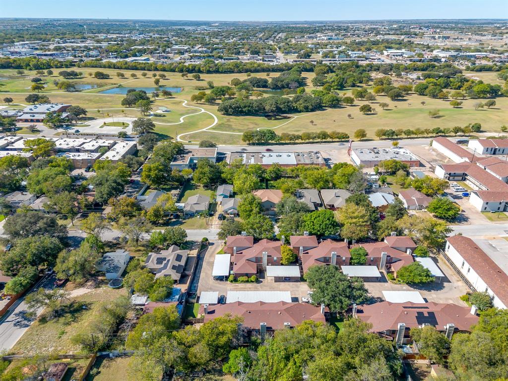 3133 Sappington Place, Unit D Fort Worth, TX 76116 - Photo 6 of 28 an aerial view of residential houses with outdoor space