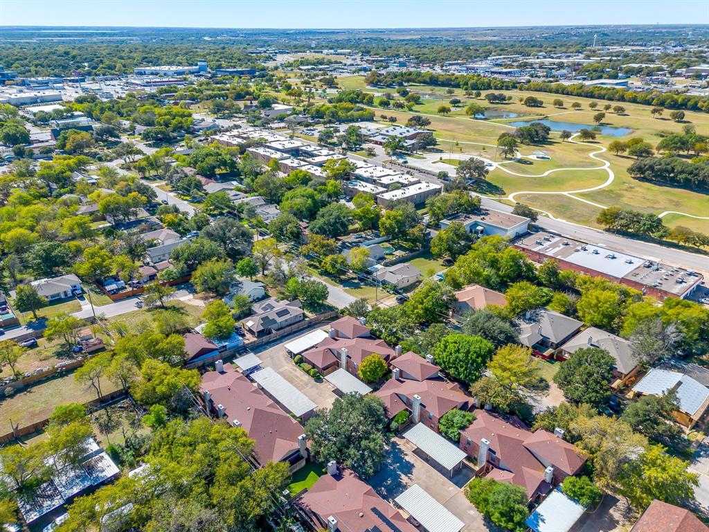3133 Sappington Place, Unit D Fort Worth, TX 76116 - Photo 7 of 28 an aerial view of residential houses with outdoor space