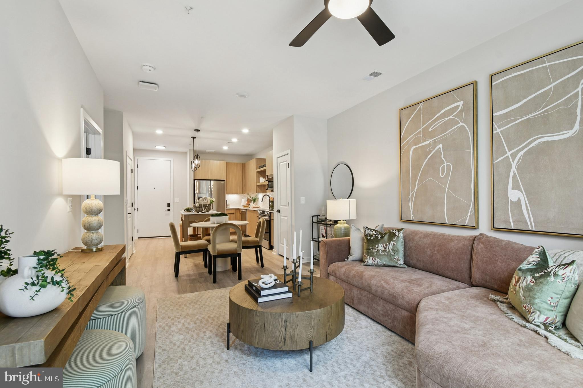 43601 Charitable Street, Unit 273 Ashburn, VA 20148 - Photo 8 of 12 a living room with furniture and a large window