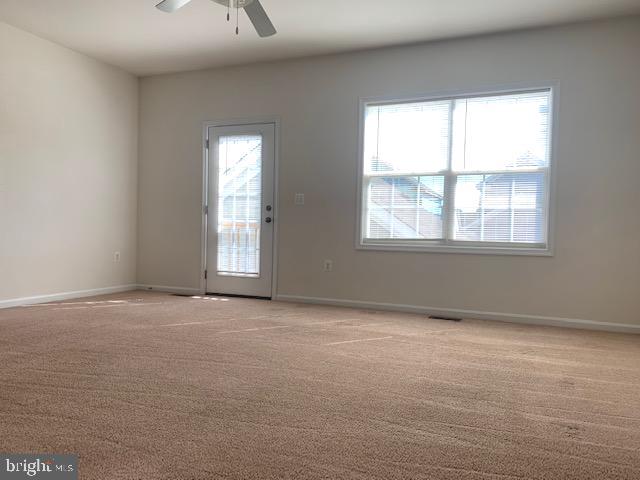 17275 Library Boulevard Ruther Glen, VA 22546 - Photo 7 of 18 an empty room with a window
