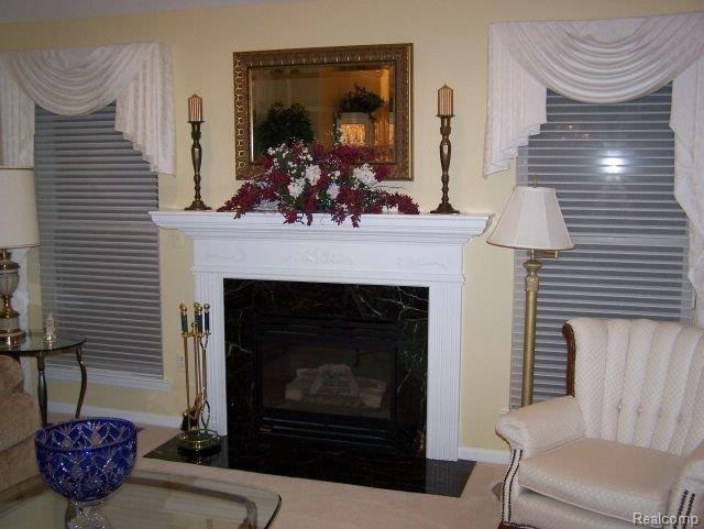 1000 Churchill Circle, Unit 31 Rochester, MI 48307 - Photo 5 of 25 Living room fireplace