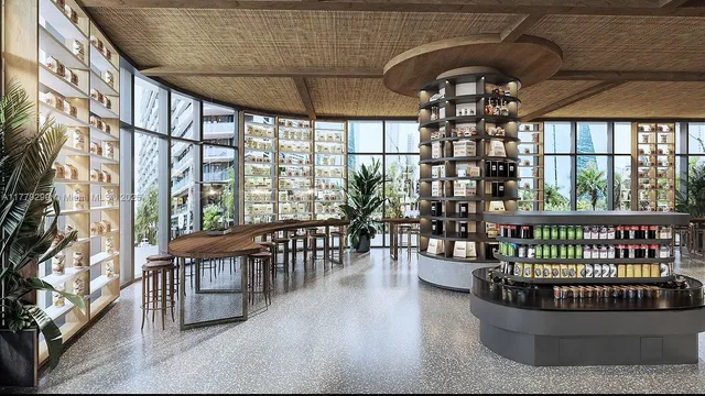 a view of a patio with a table and chairs and a small yard