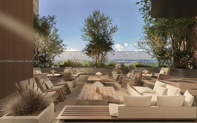 a view of balcony with wooden floor and seating space