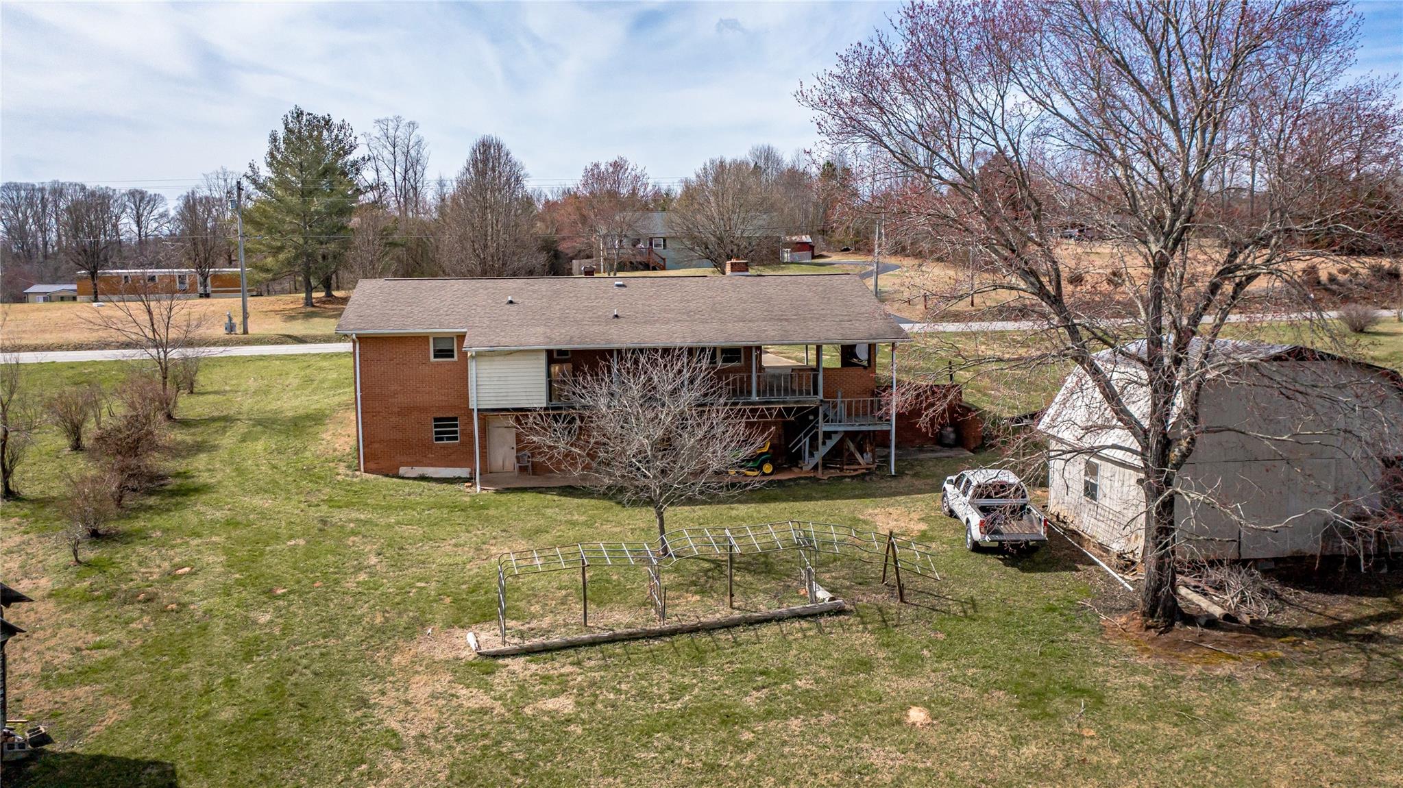 1437 Conley Road Morganton, NC 28655 - Photo 11 of 44 a view of a house with a yard