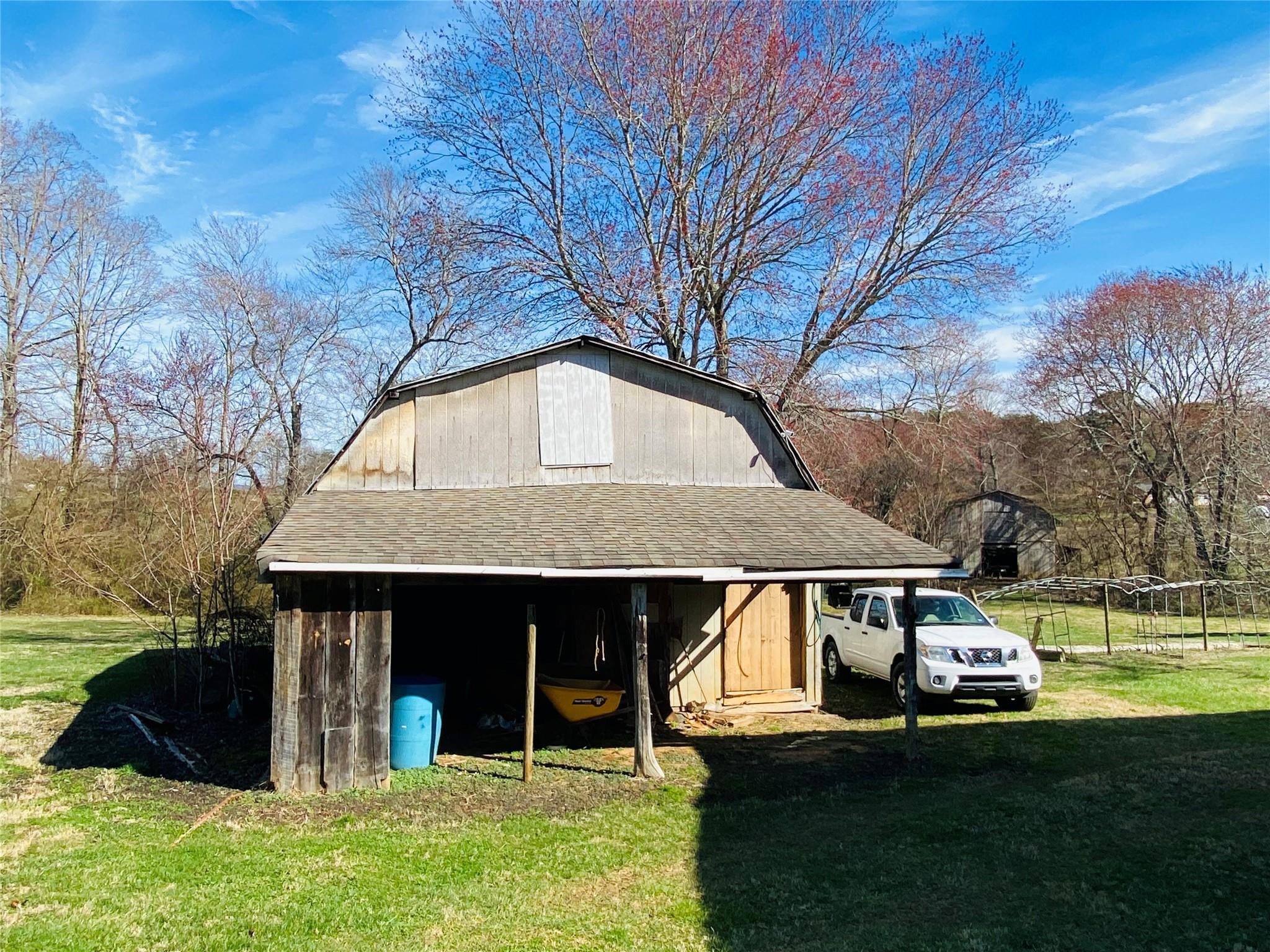 1437 Conley Road Morganton, NC 28655 - Photo 15 of 44 a view of a house with a yard