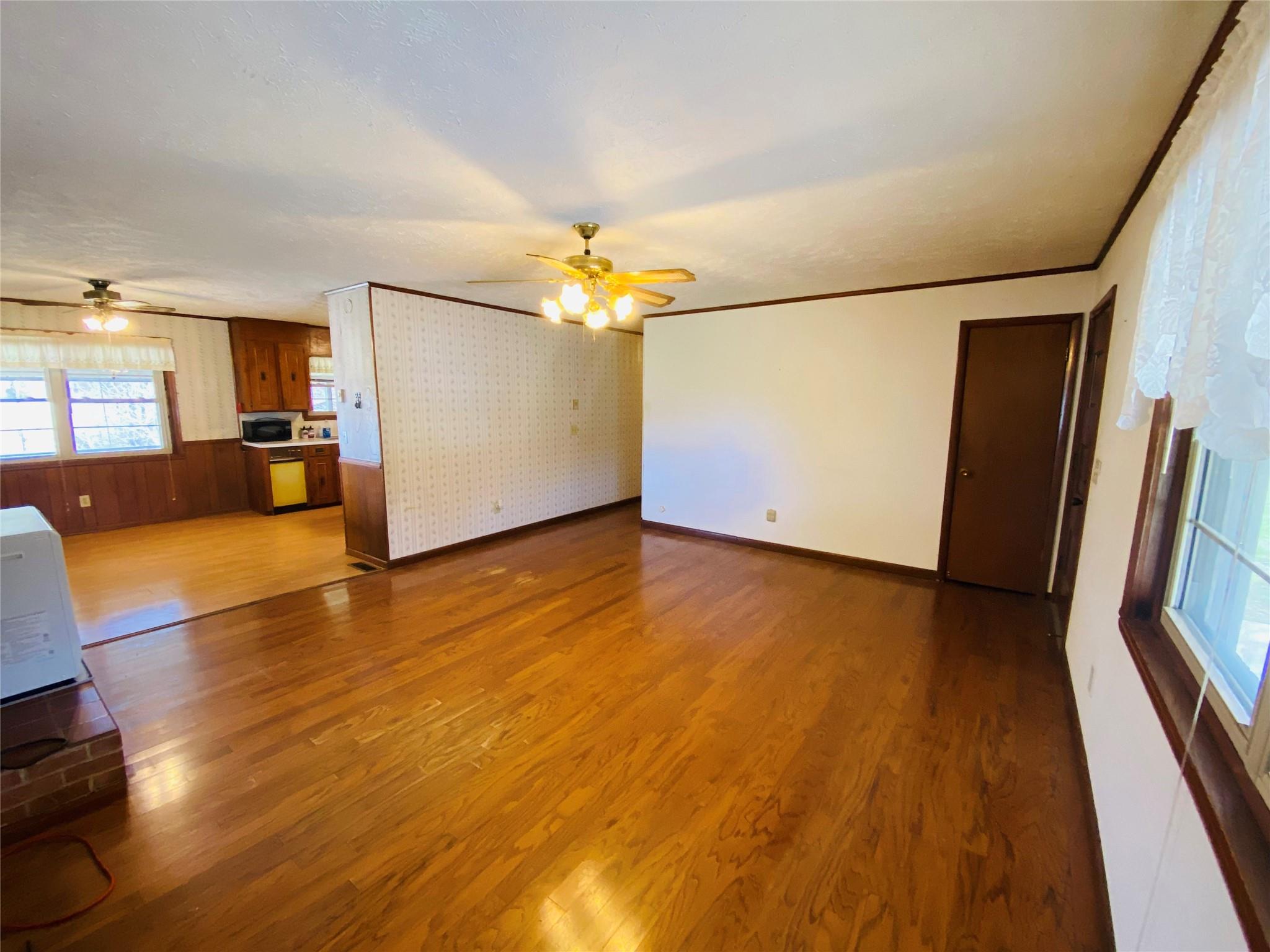 1437 Conley Road Morganton, NC 28655 - Photo 19 of 44 a view of a livingroom with furniture wooden floor and cabinet