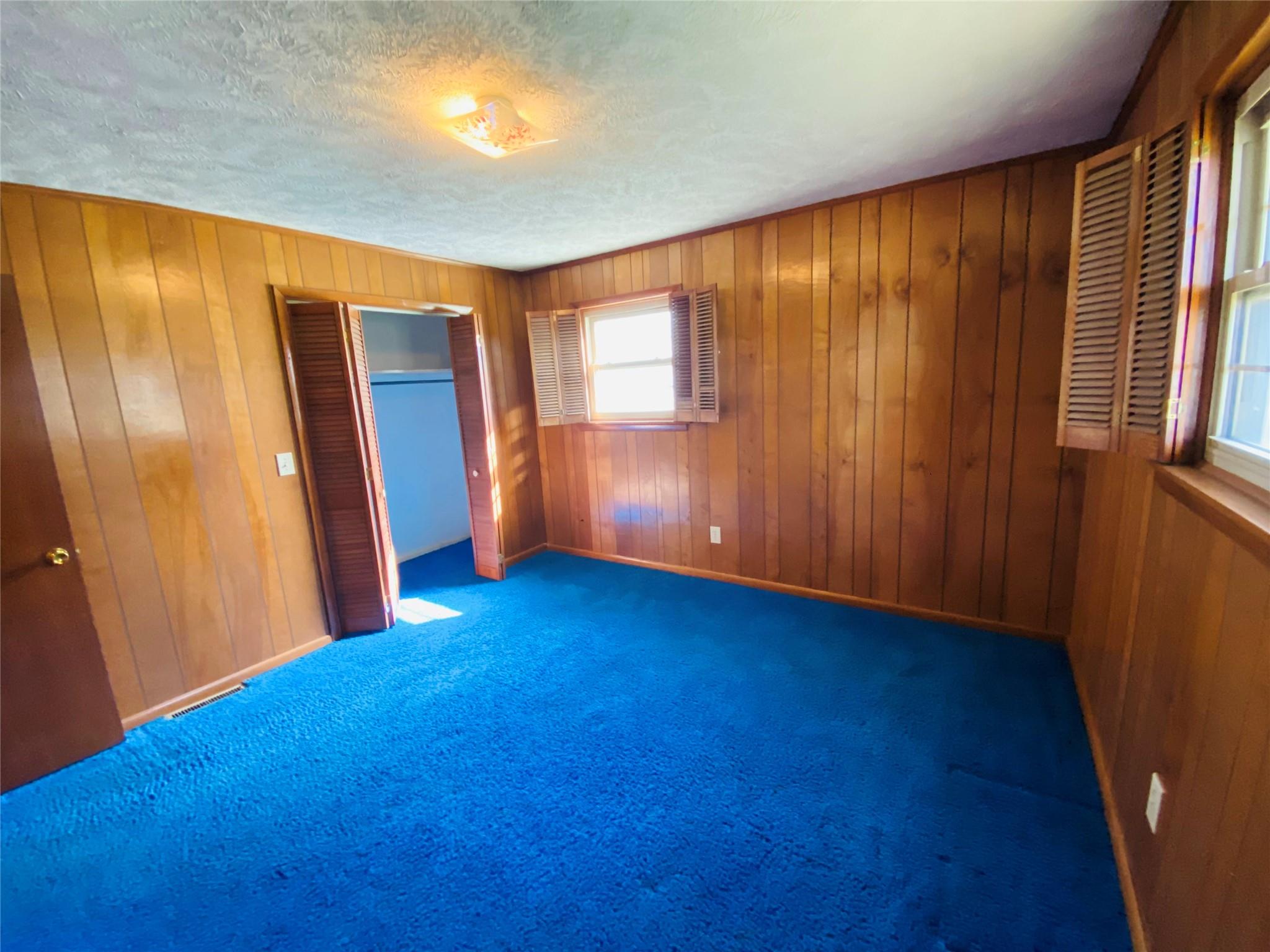 1437 Conley Road Morganton, NC 28655 - Photo 35 of 44 an empty room with windows and closet