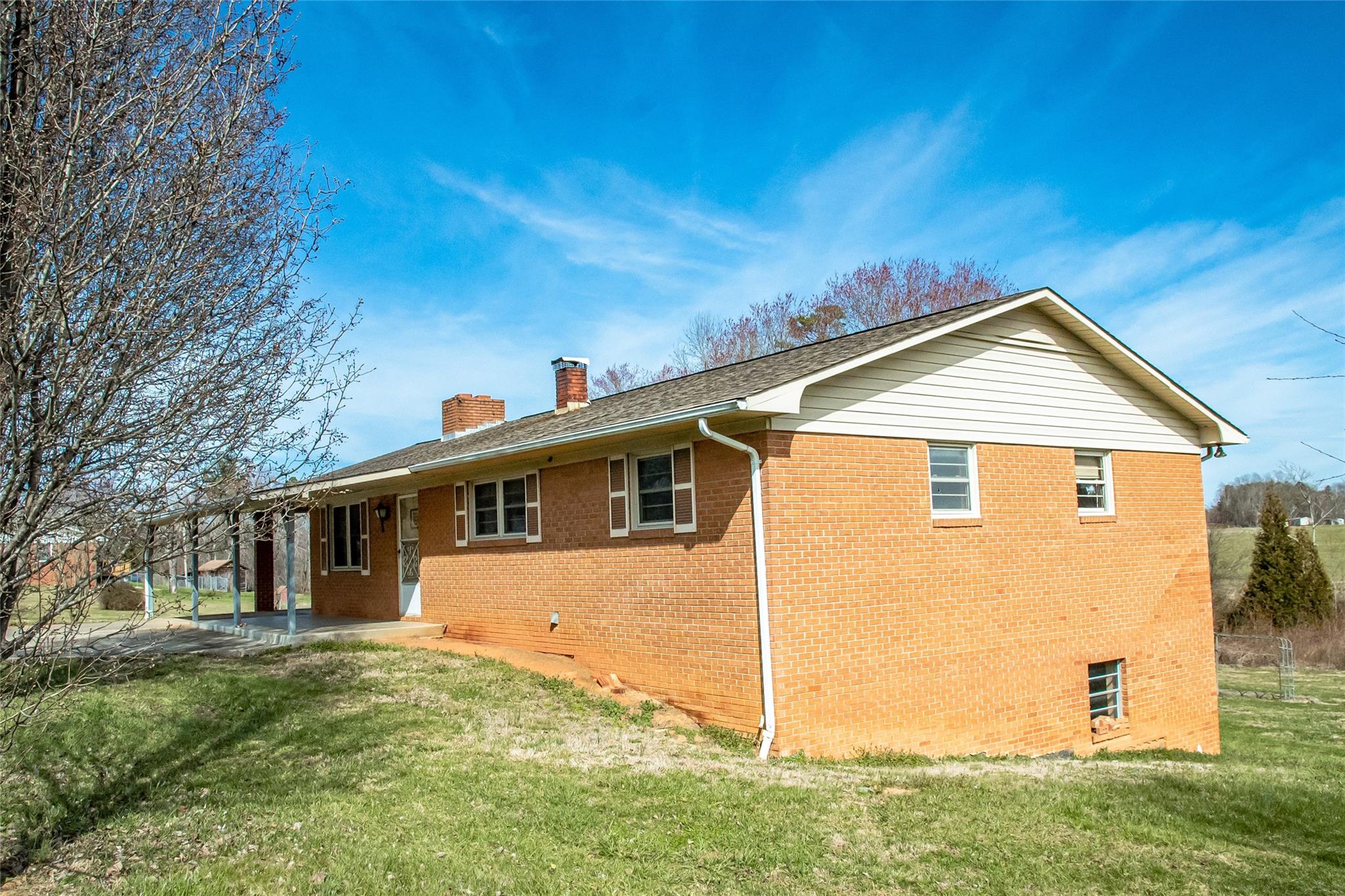 1437 Conley Road Morganton, NC 28655 - Photo 4 of 44 a view of front of house with a yard