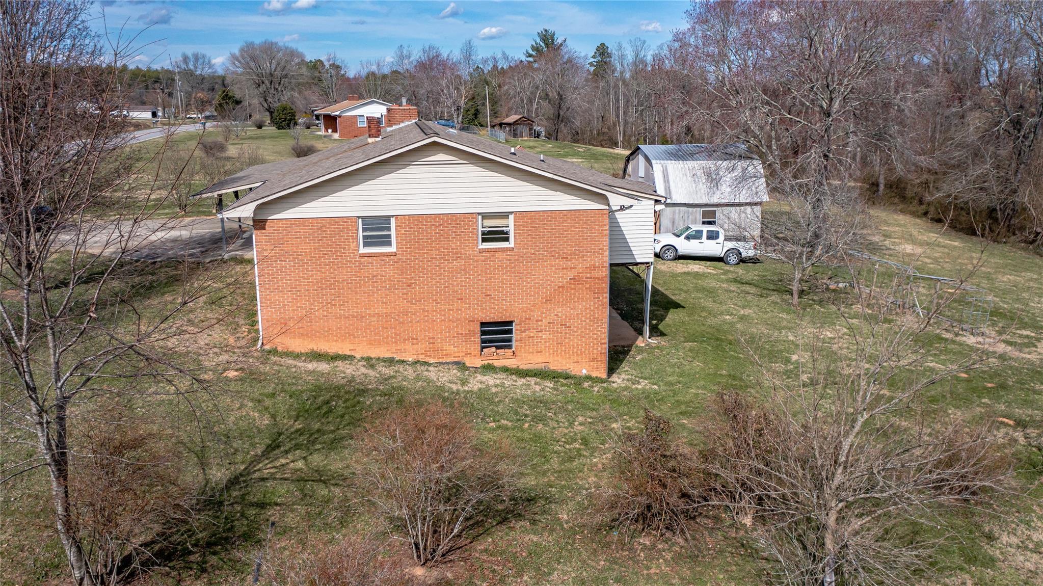 1437 Conley Road Morganton, NC 28655 - Photo 5 of 44 a view of a house with backyard