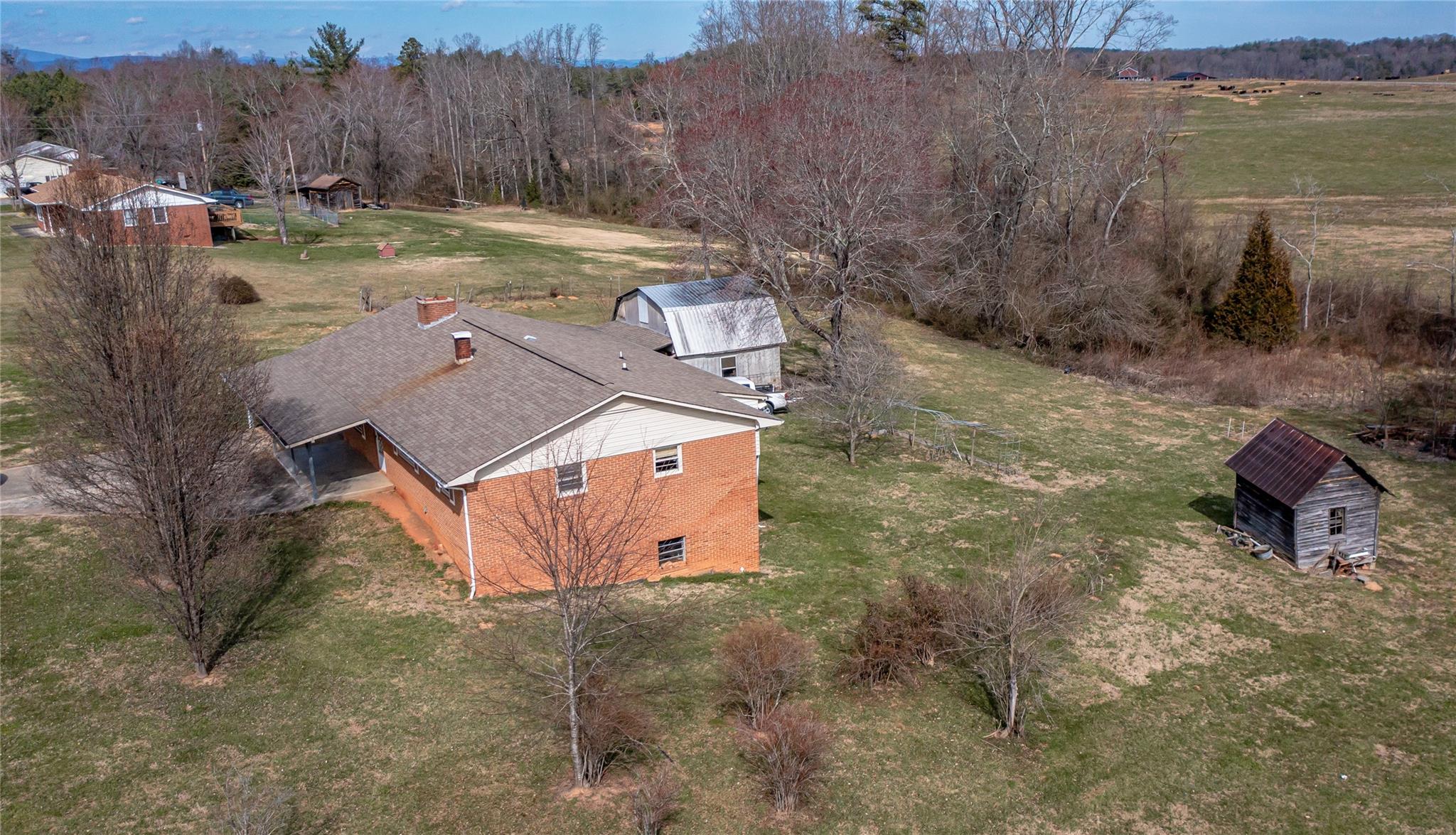 1437 Conley Road Morganton, NC 28655 - Photo 10 of 44 an aerial view of a house with mountain view
