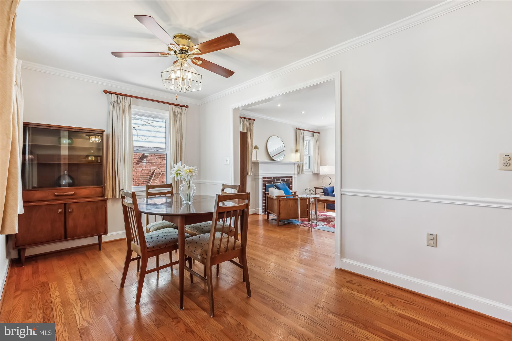 1711 Cody Drive Silver Spring, MD 20902 - Photo 12 of 50 a view of a dining room with furniture and wooden floor