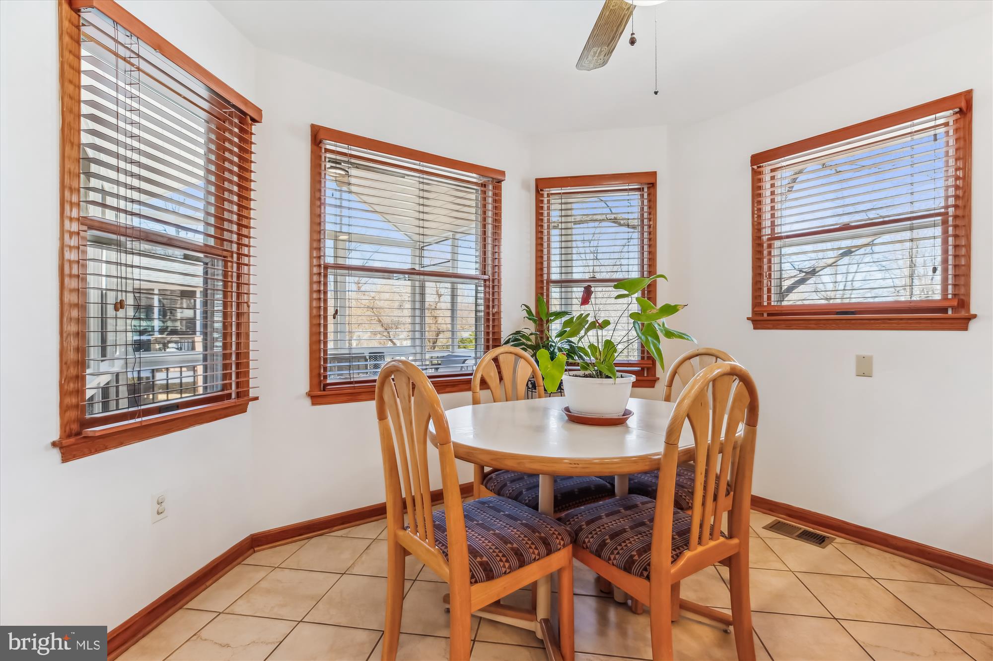 1711 Cody Drive Silver Spring, MD 20902 - Photo 18 of 50 a dining room with furniture and window