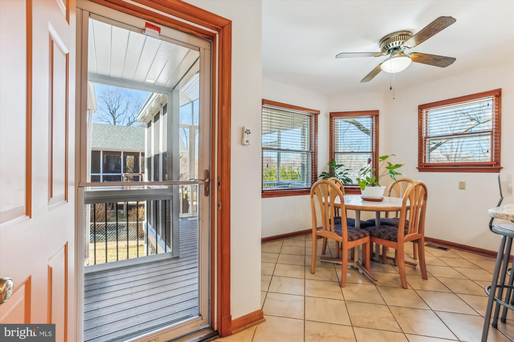 1711 Cody Drive Silver Spring, MD 20902 - Photo 21 of 50 a dining room with furniture a chandelier and wooden floor
