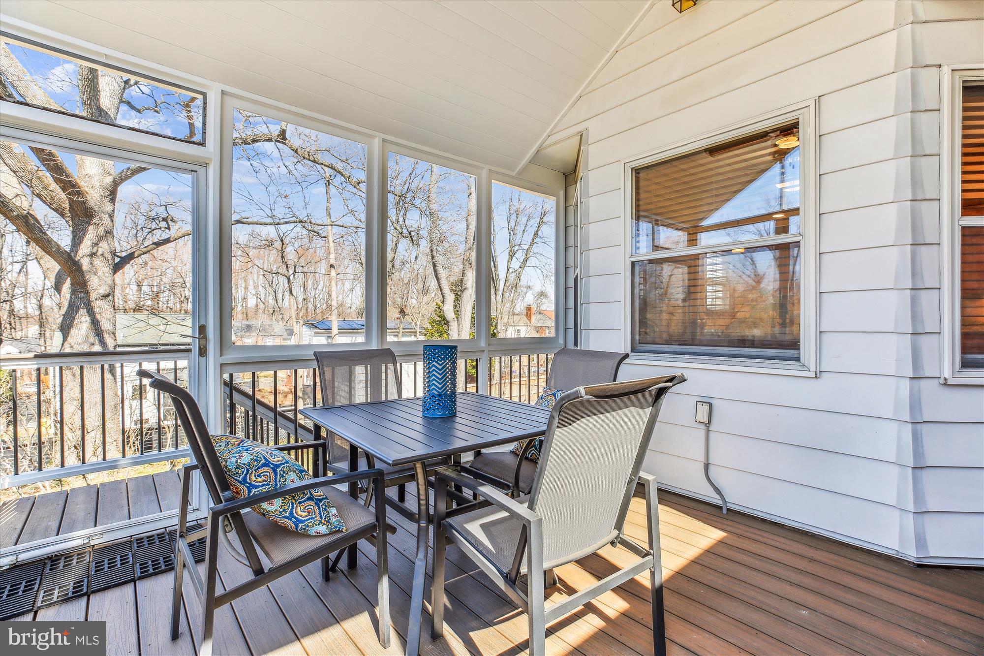 1711 Cody Drive Silver Spring, MD 20902 - Photo 25 of 50 a view of a dining room with furniture large window and wooden floor