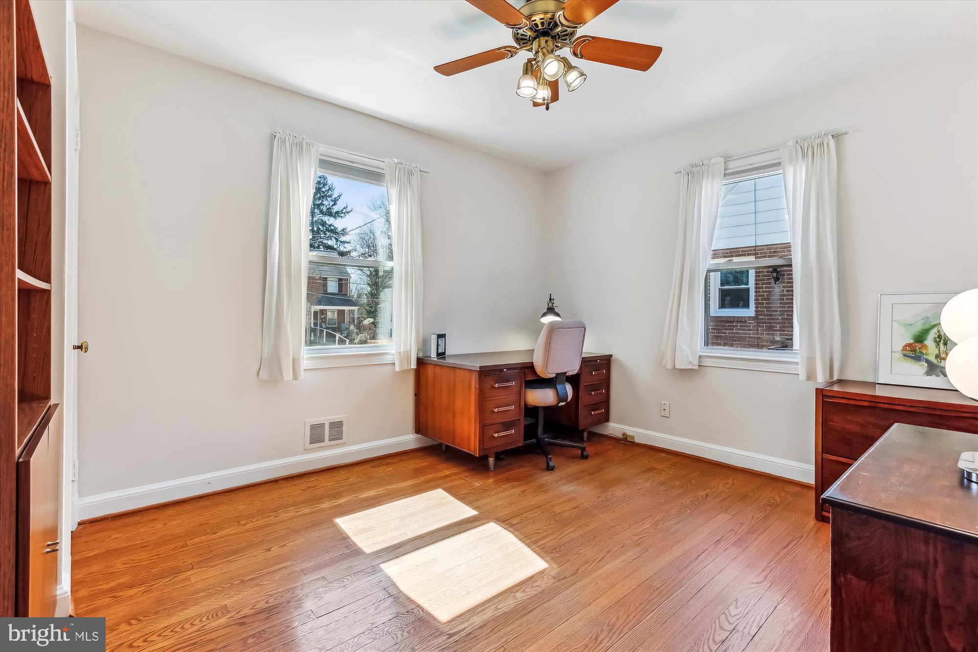 1711 Cody Drive Silver Spring, MD 20902 - Photo 27 of 50 a living room with furniture and a window