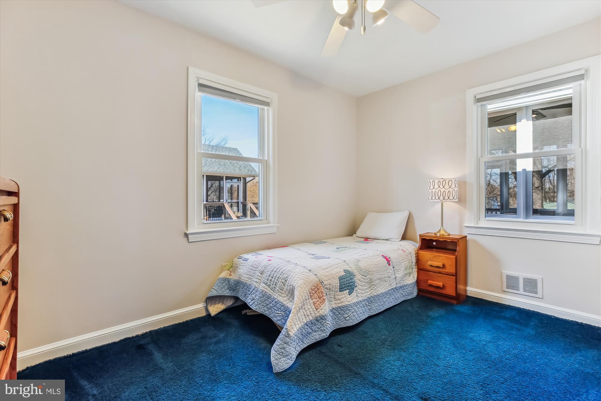 1711 Cody Drive Silver Spring, MD 20902 - Photo 30 of 50 a bedroom with a bed and a window