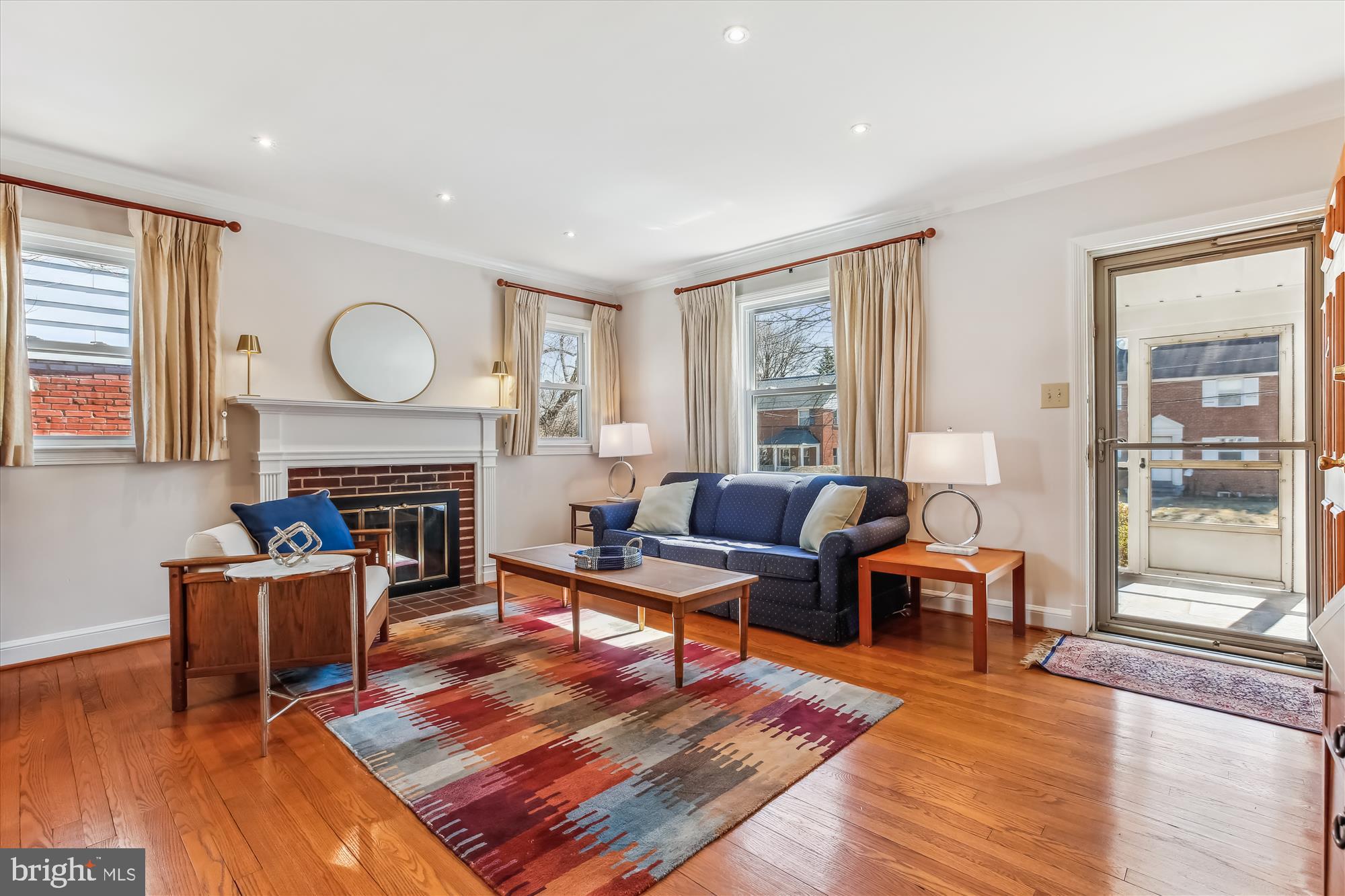 1711 Cody Drive Silver Spring, MD 20902 - Photo 4 of 50 a living room with fireplace furniture and a fireplace