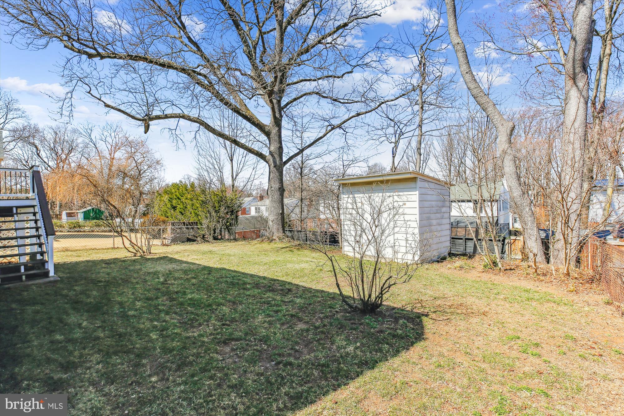 1711 Cody Drive Silver Spring, MD 20902 - Photo 45 of 50 a view of a yard with a house and a tree