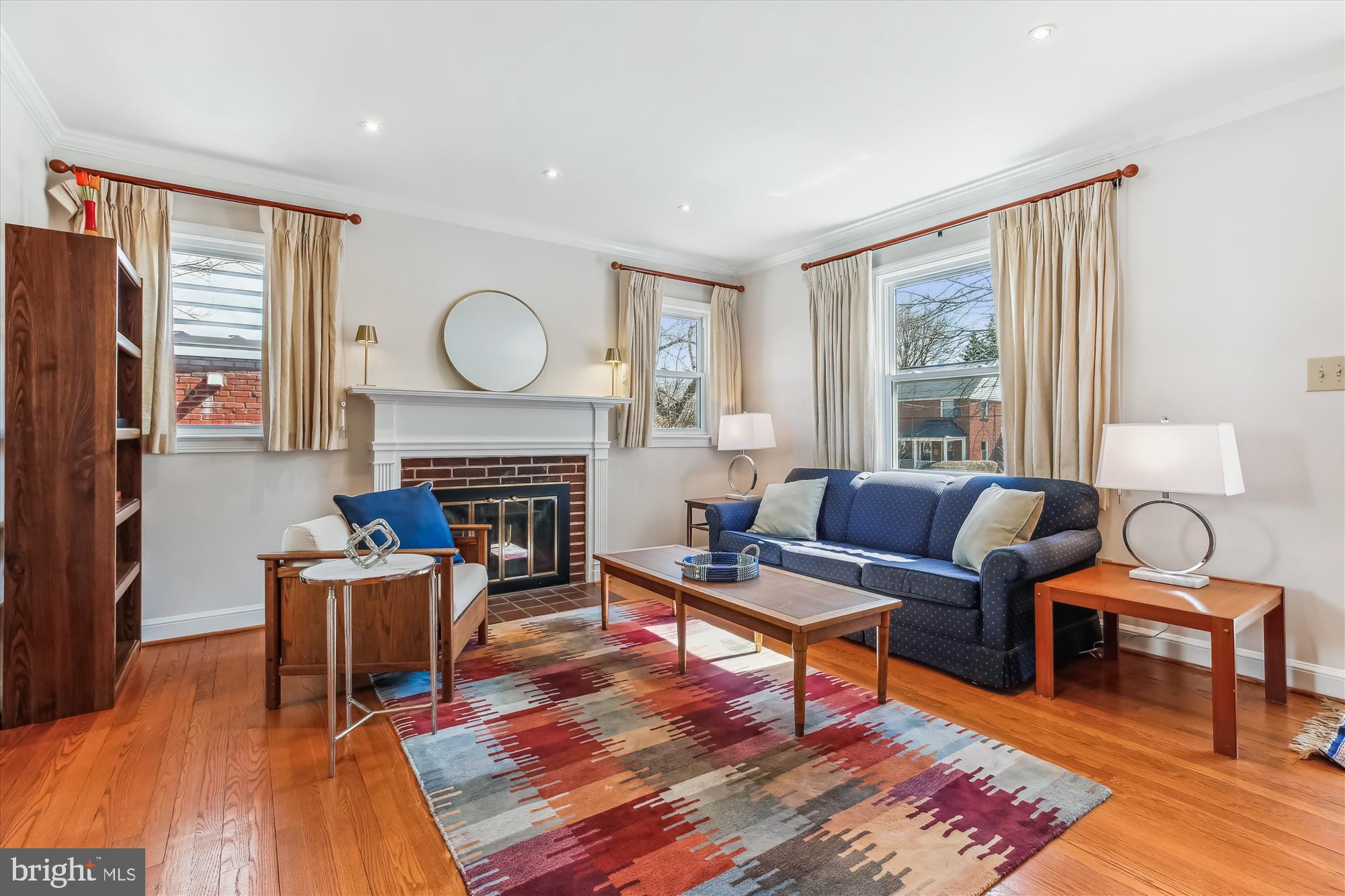 1711 Cody Drive Silver Spring, MD 20902 - Photo 5 of 50 a living room with furniture and a fireplace