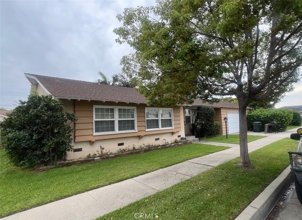 6460 Dos Rios Road Downey, CA 90240 - Photo 3 of 39 West side view of Home