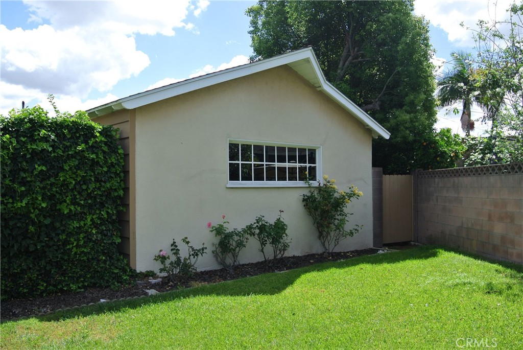 6460 Dos Rios Road Downey, CA 90240 - Photo 4 of 39 West side view of Home