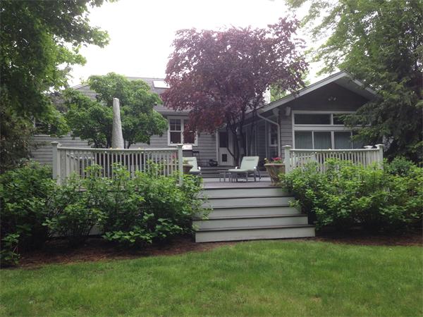 70 Clifton Road Newton, MA 02459 - Photo 13 of 13 a front view of a house with a garden