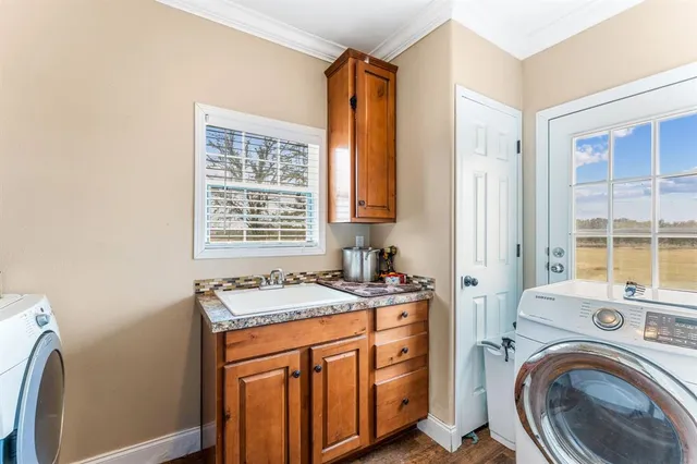 a utility room with dryer and washer