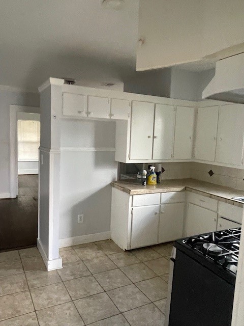 3815 Baden Street Houston, TX 77009 - Photo 4 of 7 a kitchen with a sink and cabinets