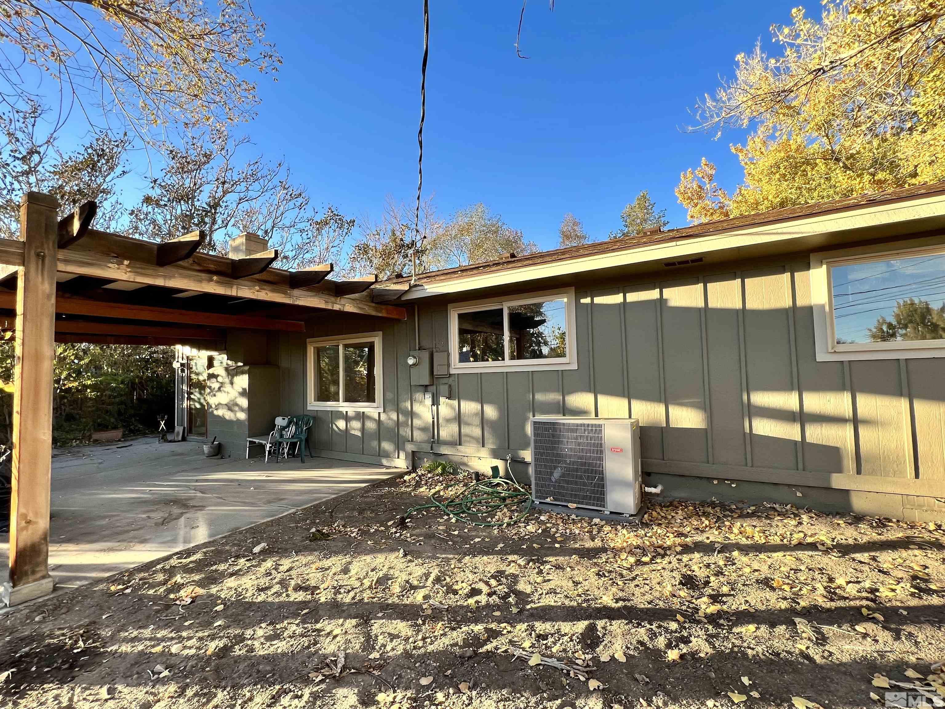 4475 Apollo Drive Carson City, NV 89706 - Photo 21 of 40 a front view of a house with a yard