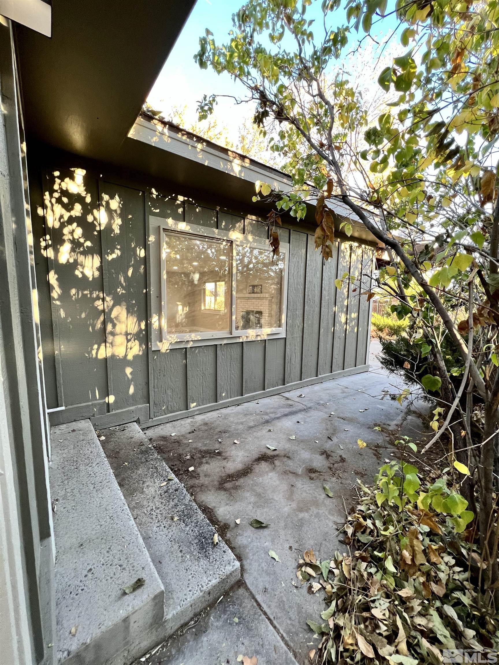 4475 Apollo Drive Carson City, NV 89706 - Photo 23 of 40 a view of a house with a tree