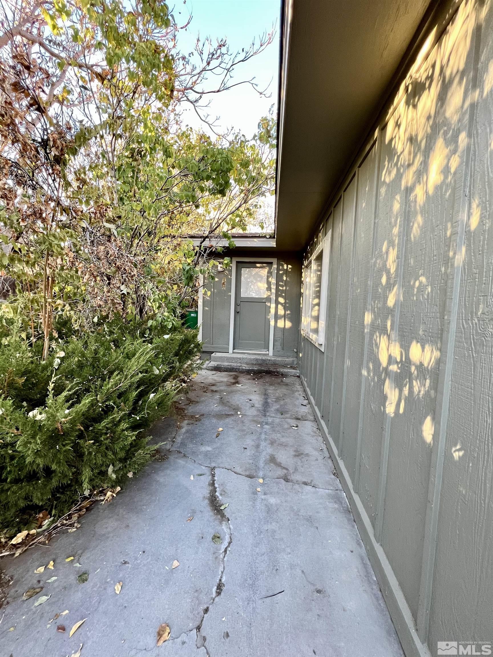 4475 Apollo Drive Carson City, NV 89706 - Photo 24 of 40 a view of a house with a yard