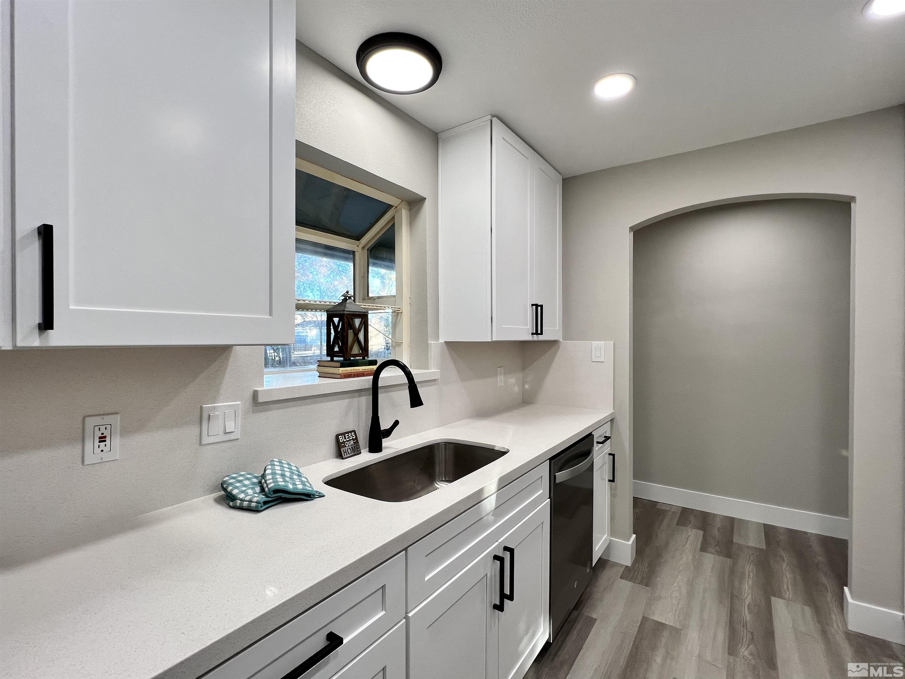 4475 Apollo Drive Carson City, NV 89706 - Photo 27 of 40 a kitchen with a sink cabinets and window