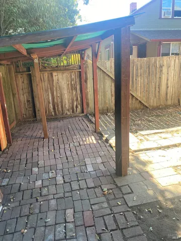 a view of a backyard of the house