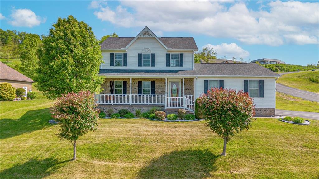 116 Mason Drive Windber, PA 15963 - Photo 1 of 35 a front view of a house with a yard