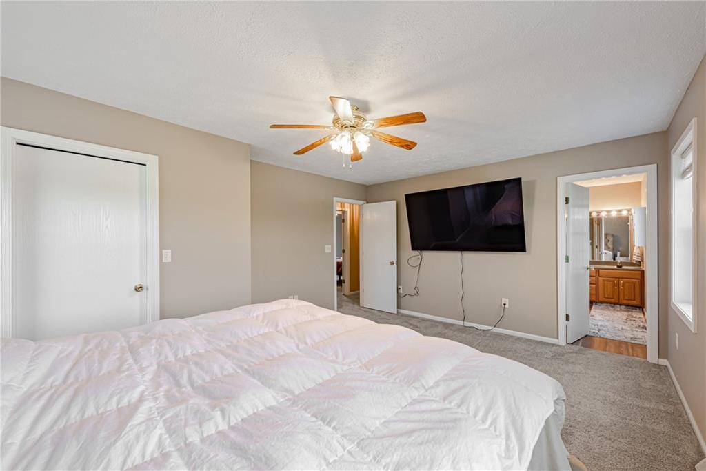 116 Mason Drive Windber, PA 15963 - Photo 20 of 35 a bedroom with a bed and a flat screen tv