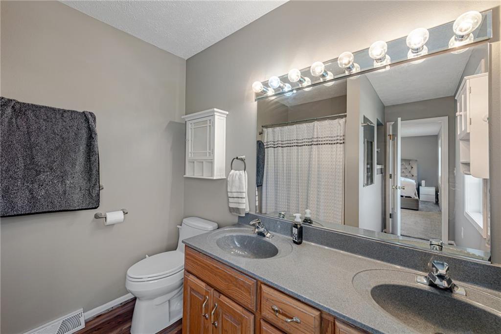 116 Mason Drive Windber, PA 15963 - Photo 21 of 35 a bathroom with a double vanity sink and a mirror