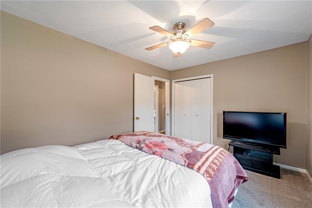 116 Mason Drive Windber, PA 15963 - Photo 26 of 35 a bedroom with a flat screen tv and a bed