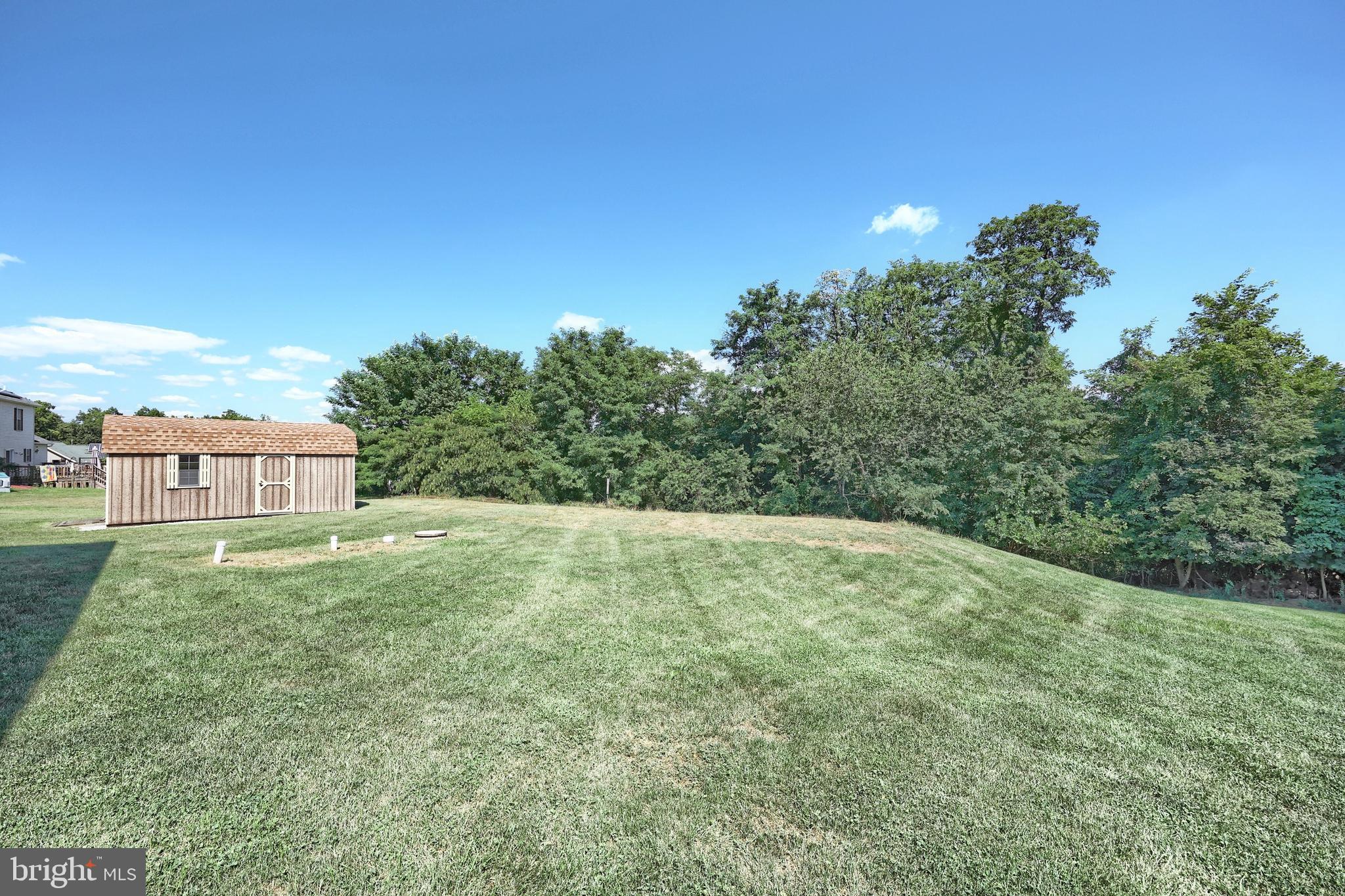965 East Butter Road York, PA 17406 - Photo 14 of 54 a view of a big yard with a house in the background