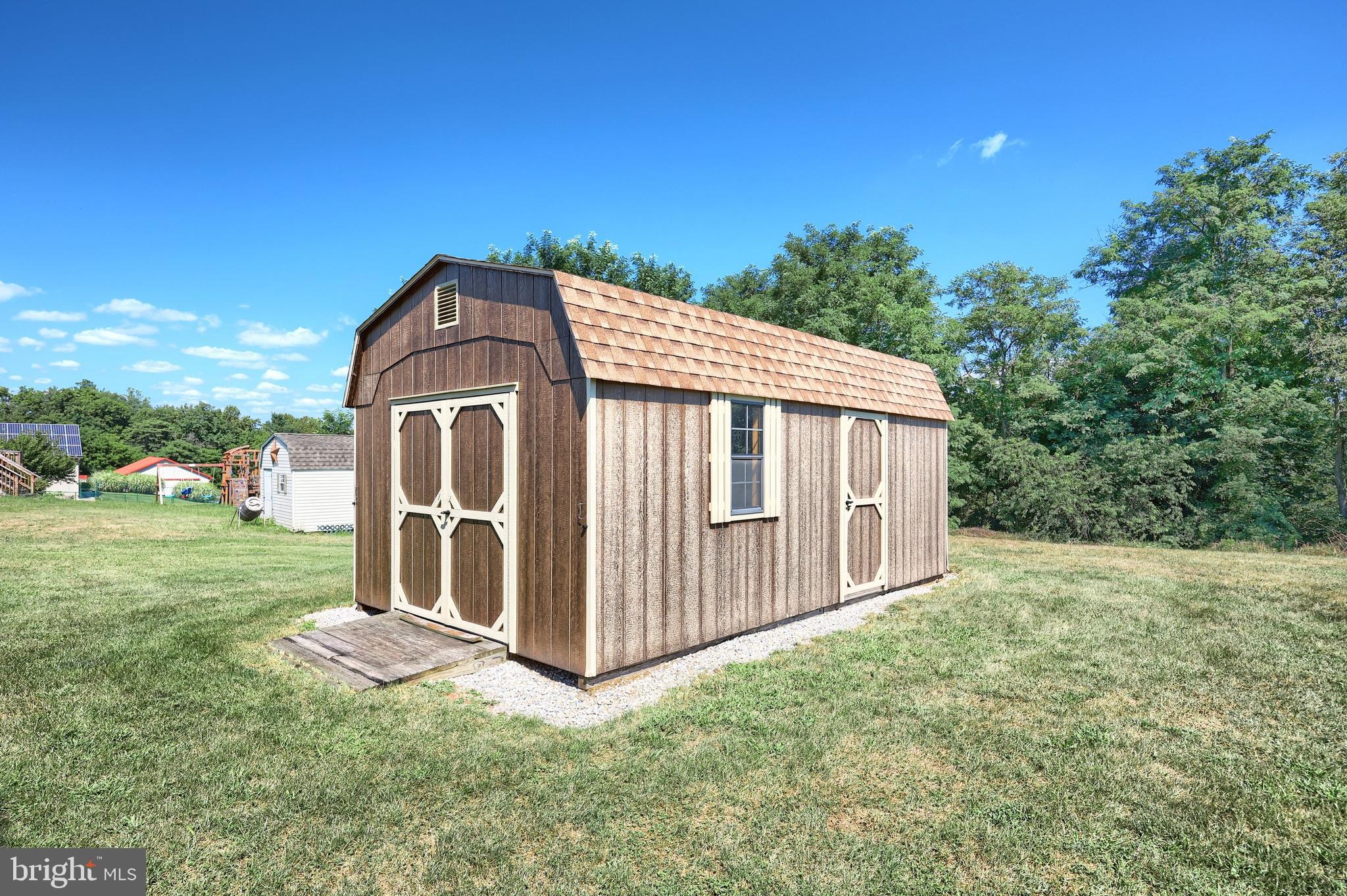 965 East Butter Road York, PA 17406 - Photo 16 of 54 a view of a house with a yard