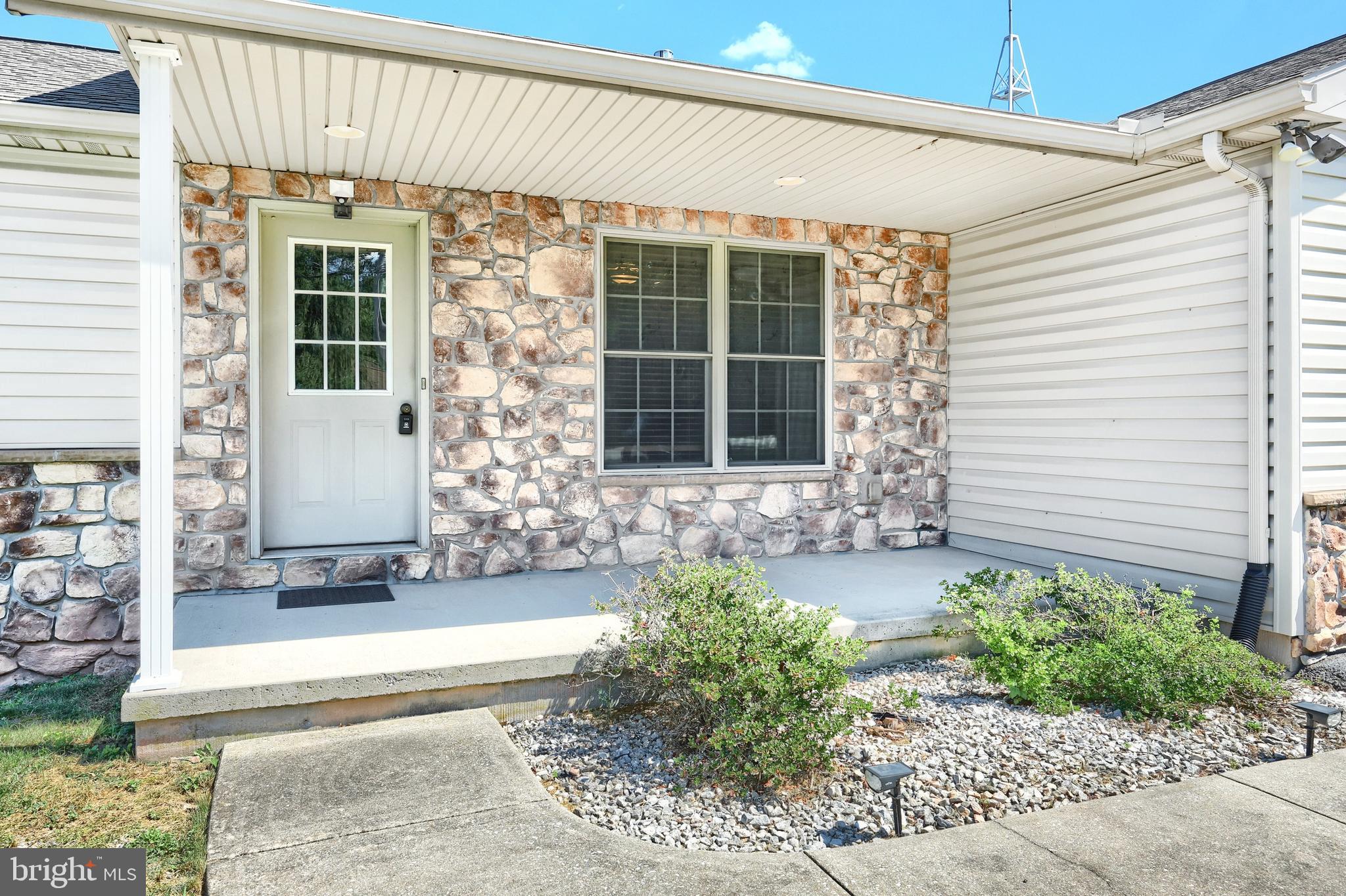 965 East Butter Road York, PA 17406 - Photo 18 of 54 a front view of a house with a yard