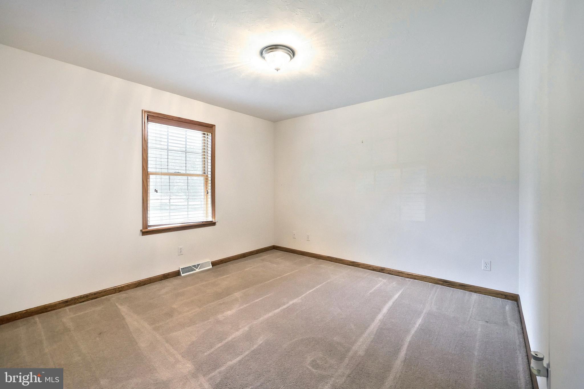 965 East Butter Road York, PA 17406 - Photo 28 of 54 an empty room with windows