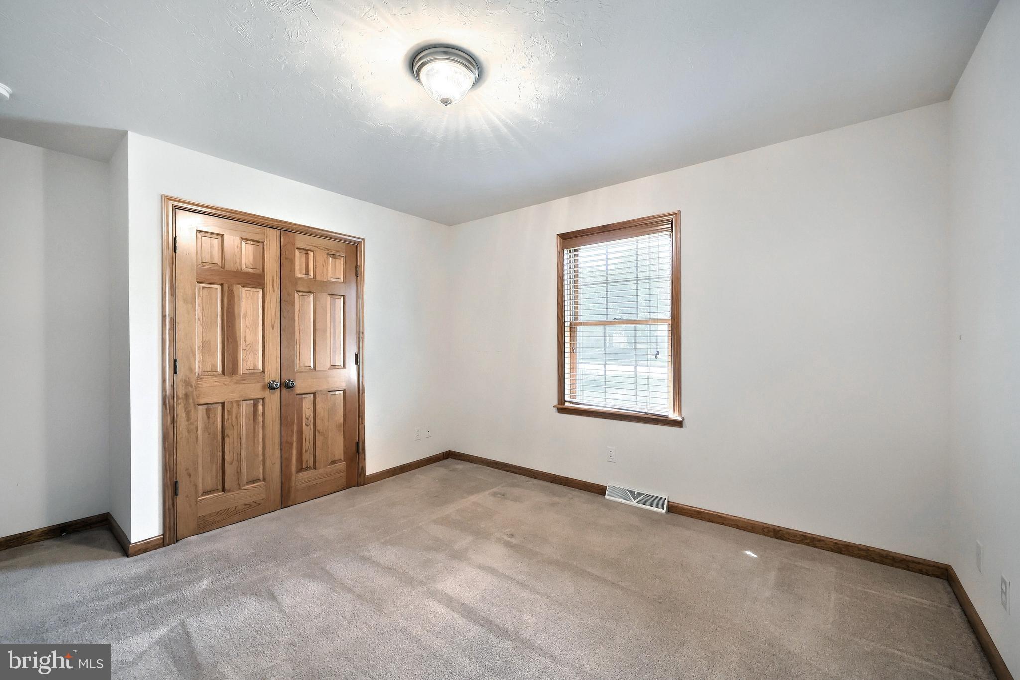 965 East Butter Road York, PA 17406 - Photo 29 of 54 an empty room with windows