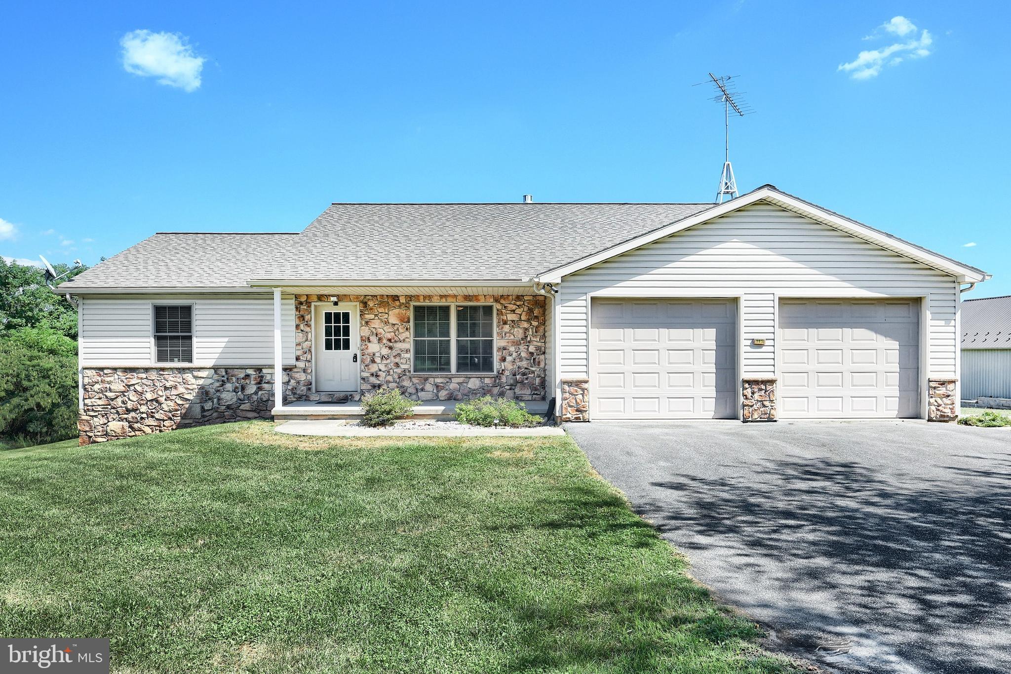965 East Butter Road York, PA 17406 - Photo 3 of 54 a front view of a house with a yard and porch