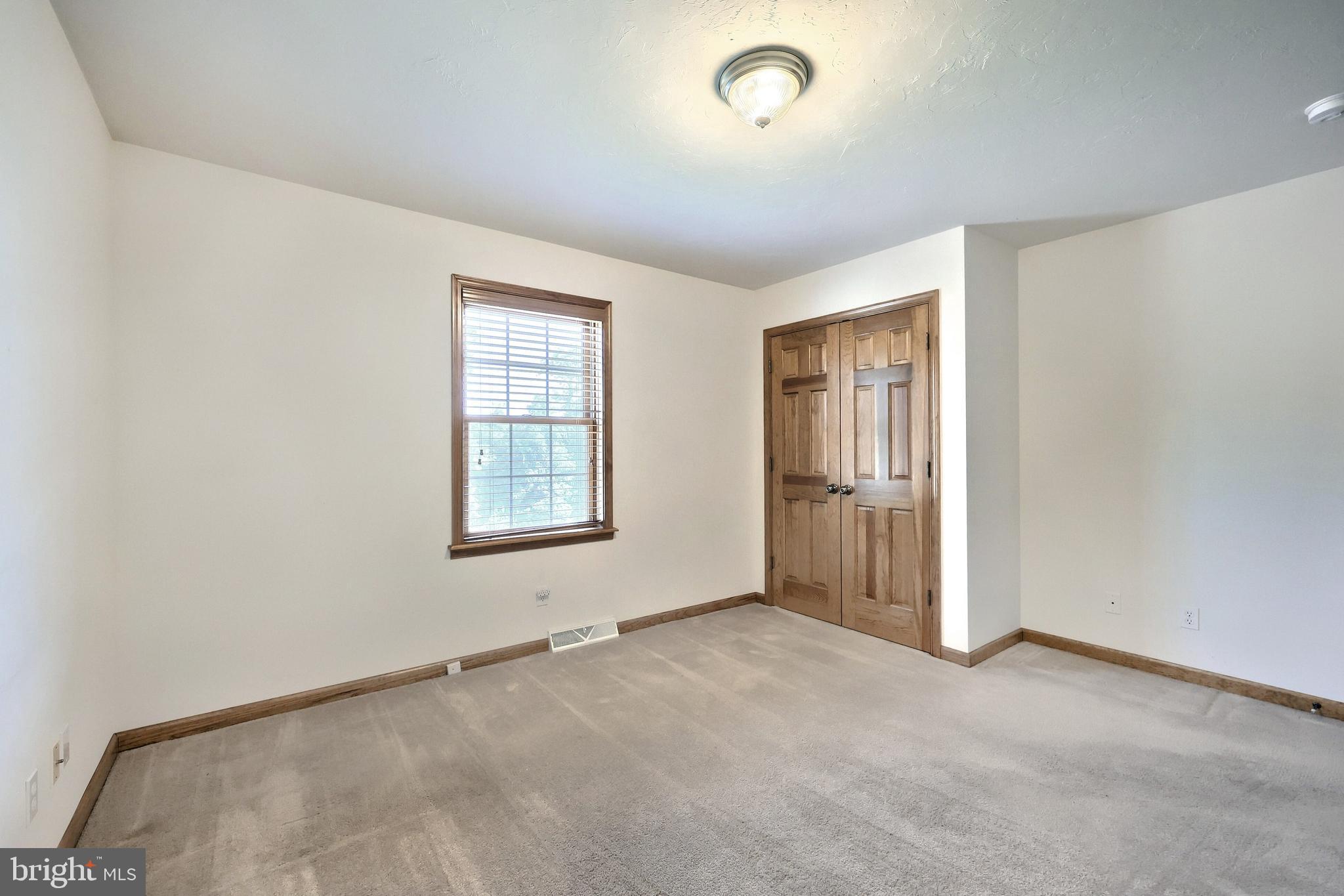 965 East Butter Road York, PA 17406 - Photo 31 of 54 an empty room with windows