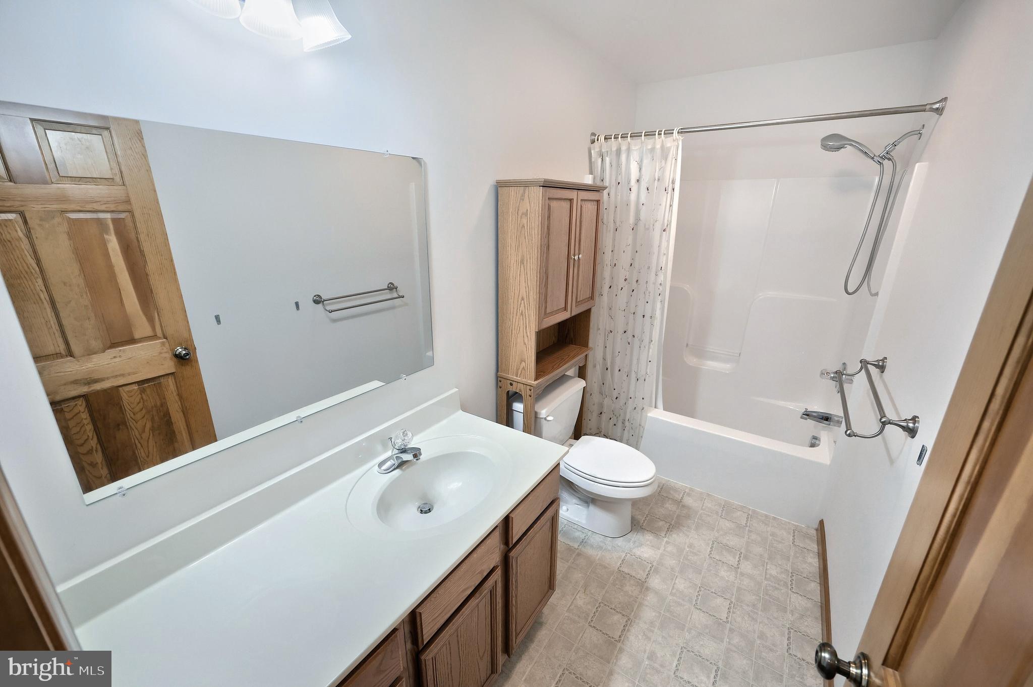 965 East Butter Road York, PA 17406 - Photo 32 of 54 a bathroom with a sink a toilet a tub and shower