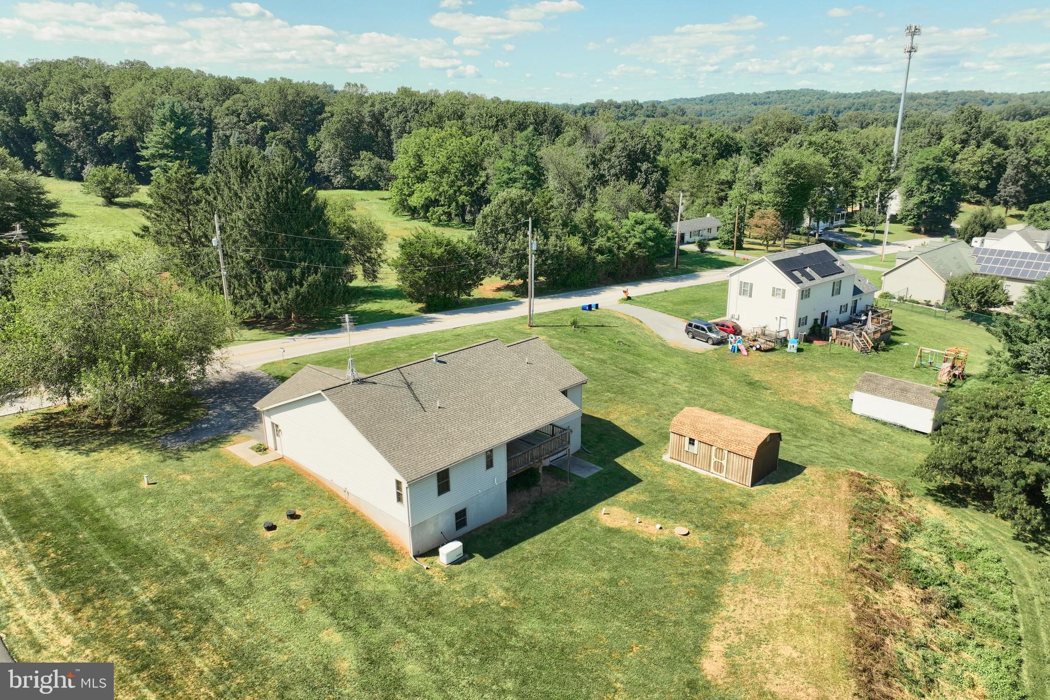 965 East Butter Road York, PA 17406 - Photo 52 of 54 an aerial view of a house with yard and lake view