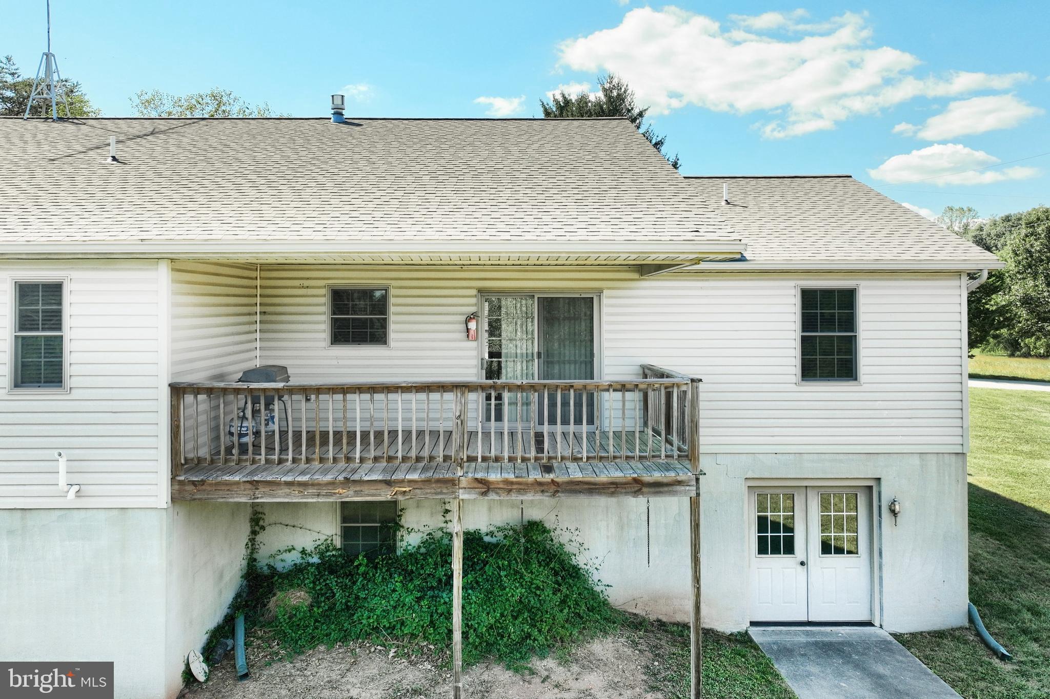 965 East Butter Road York, PA 17406 - Photo 10 of 54 a view of a house with a deck and furniture