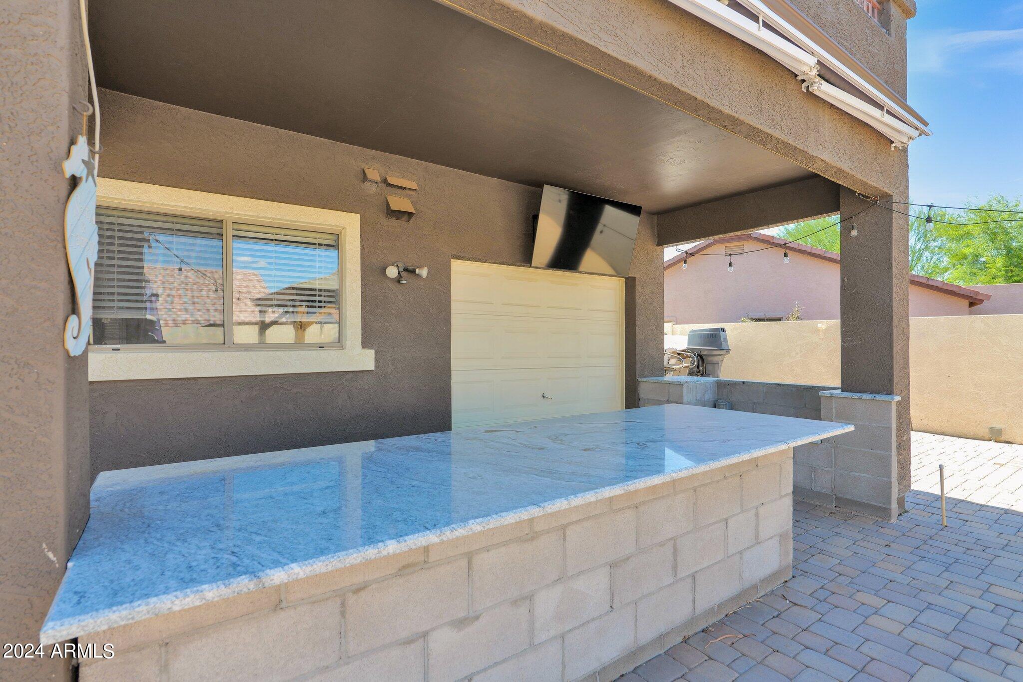 3298 East Bonanza Road Gilbert, AZ 85297 - Photo 45 of 55 3298 Bonanza - 40Built-in BBQ Garage Doo